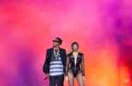 Beyonce and JAY Z perform during the Beyonce and Jay Z - On the Run tour at Stade De France on Friday, Sept. 13, 2014, in Paris, France. (Photo by Rob Hoffman/Invision for Parkwood Entertainment/AP Images)