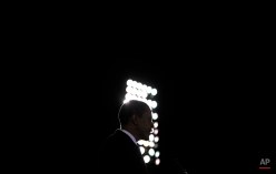 Democratic presidential candidate, Sen. Barack Obama, D-Ill., is silhouetted as he speaks at a rally in Norfolk, Va., on Oct. 28, 2008. (AP Photo/Jae C. Hong)