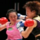Japanese champion Kumiko Seeser Ikehara, left, and her compatriot challenger Kayoko Ebata exchange punches in the sixth round of their WBO female minimum weight boxing title match in Tokyo Wednesday, May 6, 2015. Ikehara defended her title in sixth rounds by 2-1 decision. (AP Photo/Toru Takahashi)