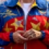 Venezuela's first lady Cilia Flores wears a jacket made in the colors of Venezuela's flag during a May Day rally in Caracas, Venezuela, Friday, May 1, 2015. Flores' jacket reads her name, along with her official title "Primera Combatiente." Instead of first lady, Flores' goes by the title "First Fighter." (AP Photo/Fernando Llano)