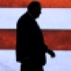 Former Arkansas Gov. Mike Huckabee enters a stage in Hope, Ark., before announcing his entry in the race for the Republican presidential nomination Tuesday, May 5, 2015. (AP Photo/Danny Johnston)