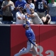 Kansas City Royals right fielder Paulo Orlando (16) leaps but can't catch a three-run home run ball hit by New York Yankees' Brian McCann during the first inning of a baseball game, Monday, May 25, 2015, in New York. (AP Photo/Julie Jacobson)