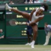 Serena Williams of the United States returns the ball to Victoria Azarenka of Belarus during their singles match at the All England Lawn Tennis Championships in Wimbledon, London, Tuesday July 7, 2015. (AP Photo/Pavel Golovkin)