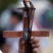 In this July 5, 2015 photo, a street vendor sells a crucifix with the image of Pope Francis, at the Samanes Park where the Pope will give a mass in Guayaquil, Ecuador. Francis is making his first visit as pope to his Spanish-speaking neighborhood. He'll travel to three South American nations, Ecuador, Bolivia and Paraguay, which are beset by problems that concern him deeply, income inequality and environmental degradation. (AP Photo/Fernando Vergara)