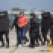 In this July 24, 2015 photo, Guatemalan drug trafficking suspect Jairo Orellana Morales is escorted by police to an aircraft prior to his extradition to the U.S. at an Air Force base in Guatemala City. Orellana, an alleged member of the Zetas drug organization in Guatemala, faces federal drug trafficking charges in Washington. (AP Photo/Luis Soto)