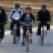 In this July 6, 2015 photo, Brazil's President Dilma Rousseff, accompanied by her protective detail, rides her bicycle near the official presidential residence Alvorada Palace, in Brasilia, Brazil. According to the Brazilian press, Rousseff has recently adopted the habit of pedaling every morning on the nearby roads. (AP Photo/Eraldo Peres)