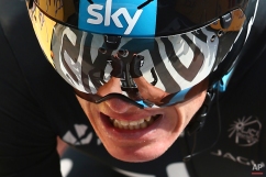 Britain's Christopher Froome strains as he crosses the finish line of the first stage of the Tour de France cycling race, an individual time trial over 13.8 kilometers (8.57 miles), with start and Finish in Utrecht, Netherlands, Saturday, July 4, 2015. (AP Photo/Peter Dejong)
