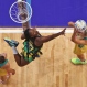 Australia's Catlin Bassett, right, shoots for a goal as Jamaica's Stacian Facey jumps up to defend during their Netball World Cup semifinal in Sydney, Australia, Saturday, Aug. 15, 2015. (AP Photo/Rob Griffith)