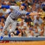 Chicago Cubs third baseman Kris Bryant can't reach a throw from home as Los Angeles Dodgers' Chase Utley takes third on a wild pitch during the sixth inning of a baseball game, Friday, Aug. 28, 2015, in Los Angeles. (AP Photo/Mark J. Terrill)