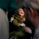 Pakistani soldiers move an injured child to an ambulance after being airlifted from Chitral, at Peshawar airbase in Pakistan, Tuesday, Oct. 27, 2015. Rescuers are struggling to reach quake-stricken regions in Pakistan and Afghanistan on Tuesday as officials said the combined death toll from the previous day's earthquake rose to hundreds. (AP Photo/Mohammad Sajjad)