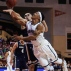 Monmouth guard Justin Robinson (12) is fouled on the way to the basket by Notre Dame guard Matt Farrell during the first half of an NCAA college basketball game Thursday, Nov. 26, 2015, in Orlando, Fla. (AP Photo/Willie J. Allen Jr.)