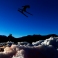 A ski jumper soars through the air above artificial snow during a trial jump at the first stage of the 64. four hills ski jumping tournament in Oberstdorf, Germany, Monday, Dec. 28, 2015. (AP Photo/Matthias Schrader)