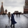 A street worker cleans paving stones in Red Square with St. Basil's Cathedral, left, Lenin Mausoleum, center, and the Spasskaya Tower, right, in Moscow, Tuesday, Dec. 22, 2015. It's usually the cold that's bitter in Moscow in December, but this year it's the humor that bites during an unusual warm spell and temperatures climbed as high as 10 degrees Celsius (50 degrees Fahrenheit). In the Russian capital in recent days, a joke began circulating on the Internet: This was nature's compensation for Russians being unable to take vacations in Egypt and Turkey this year, two top destinations for Russian winter holidays. (AP Photo/Alexander Zemlianichenko)