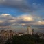 Clouds hover over the capital city of Damascus, Syria on Feb. 25, 2016. A uniquely Syrian version of normalcy prevails in the heart of Damascus, where a mix of rural refugees and sophisticated urbanites conduct their daily business and enjoy the easy cafe culture to the muffled sounds of gunfire and explosions in the distance. (AP Photo/Hassan Ammar)