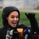 U.S. actress Angelina Jolie, Special Envoy of the United Nations High Commissioner for Refugees, waves to Syrian children during a press conference during her visit to a Syrian refugee camp, in the eastern city of Zahleh, Lebanon, Tuesday, March 15, 2016. (AP Photo/Bilal Hussein)