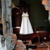 In this April 17, 2016 photo, a formal dress hangs from a wardrobe closet in a home destroyed by a 7.8-magnitude earthquake in Pedernales, Ecuador. The April 16 earthquake destroyed or damaged about 1,500 buildings and left some 23,500 people homeless, the government said. (AP Photo/Dolores Ochoa)