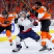 Philadelphia Flyers' Colin McDonald, right, and Washington Capitals' Matt Niskanen, center, collide as Ryan White skates past during the second period of Game 4 in the first round of the NHL Stanley Cup hockey playoffs, Wednesday, April 20, 2016, in Philadelphia. (AP Photo/Matt Slocum)