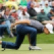 Jordan Spieth blows on his ball on the ninth hole during the par three competition at the Masters golf tournament, Wednesday, April 6, 2016, in Augusta, Ga. (AP Photo/David J. Phillip)