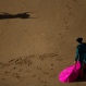 A Saltillo ranch fighting bull casts its shadow on the ground as a bullfighter looks at him during a bullfight at the Las Ventas bullring in Madrid, Spain, Tuesday, May 31, 2016. (AP Photo/Francisco Seco)