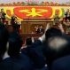 North Korean leader Kim Jong Un, center, acknowledges applause from senior leaders and party representatives upon his arrival for the party congress in Pyongyang, North Korea, Monday, May 9, 2016. North Korea's ruling-party congress on Monday announced a new title for Kim, party chairman, in a move that highlights how the authoritarian country's first congress in 36 years is aimed at bolstering the young leader. (AP Photo/Wong Maye-E)