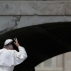 Pope Francis loses his skull cap as leaves after his weekly general audience in St. Peter's Square at the Vatican, Wednesday, June 1, 2016. (AP Photo/Alessandra Tarantino)