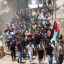 Mourners carry the body of Muhey al-Tabakhi, 12, during his funeral in the West Bank town of Al-Ram, near Jerusalem, Wednesday, July 20, 2016. A Palestinian hospital official says the boy was killed after clashes erupted between Israeli forces and protesters in the West Bank. Ramallah hospital director Ahmad Bitawi says the boy was killed by a bullet to the chest. Israeli police deny that live fire was used against protesters.(AP Photo/Nasser Shiyoukhi)